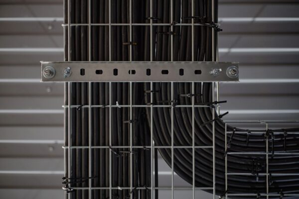 Industrial Electrical Cables Running through Metal Wire Cable Tray System